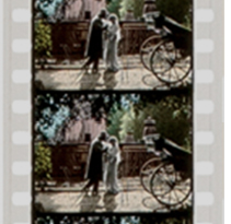 Frames of movie film with sprocket holes visible.