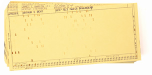 Stack of IBM punch cards, punched with names and addresses