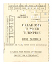 A short stub of a punch card torn off as a fare receipt for a turnpike toll