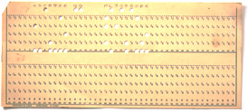 A 90-column punch card punched with round holes